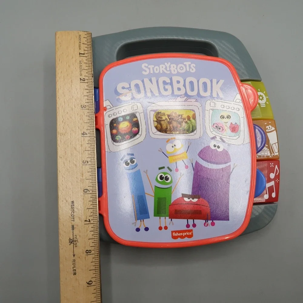 Fisher-Price StoryBots Songbook Electronic Book Lights Music  Space & Dinosaur